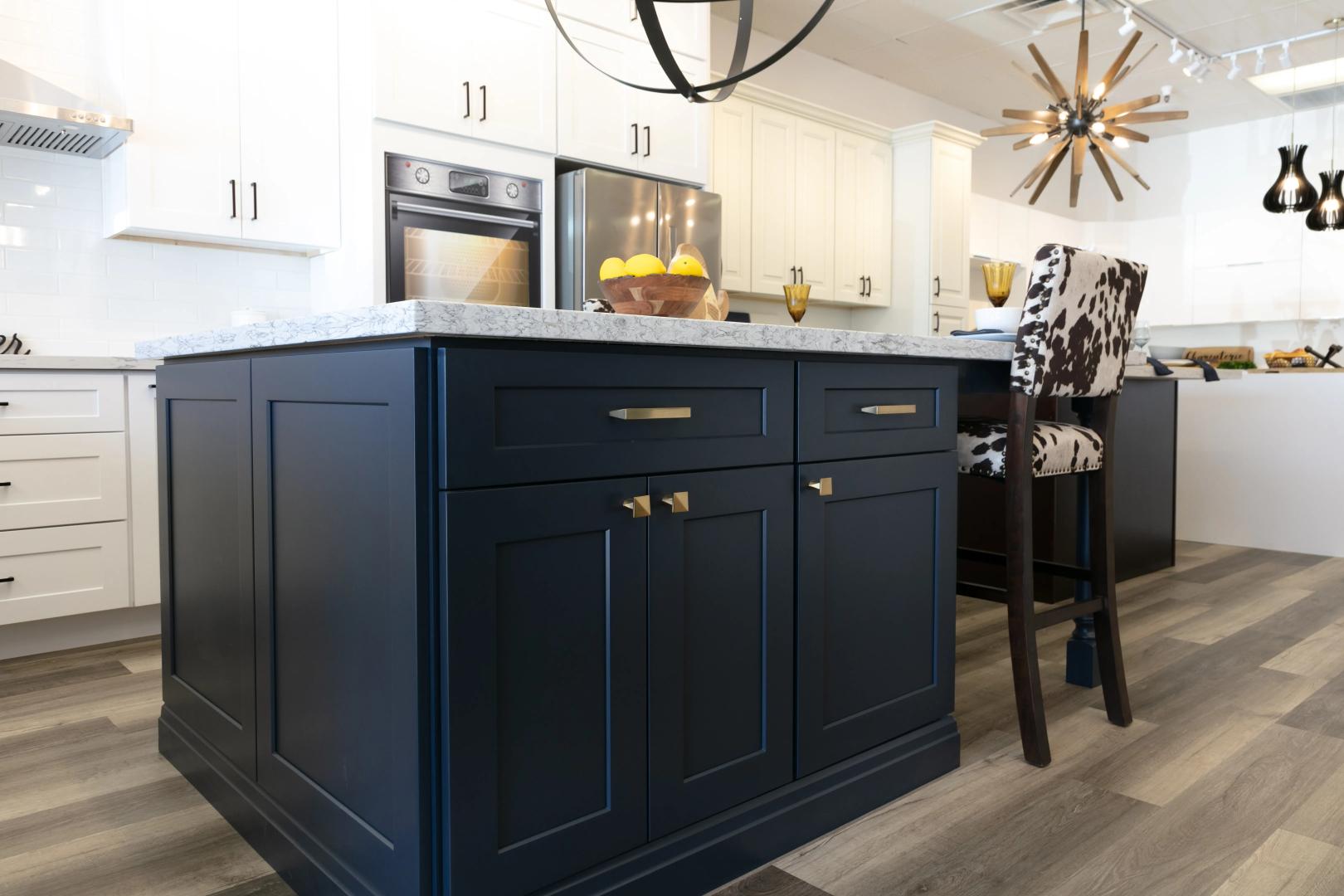 Signature Blue Shaker Cabinets with Avalanche Quartz Countertop
